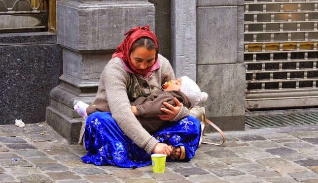 Why is the child in hands of the beggar always sleeping?
