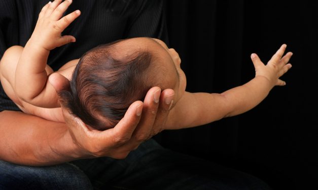 Holding infants — or not — can leave traces on their genes