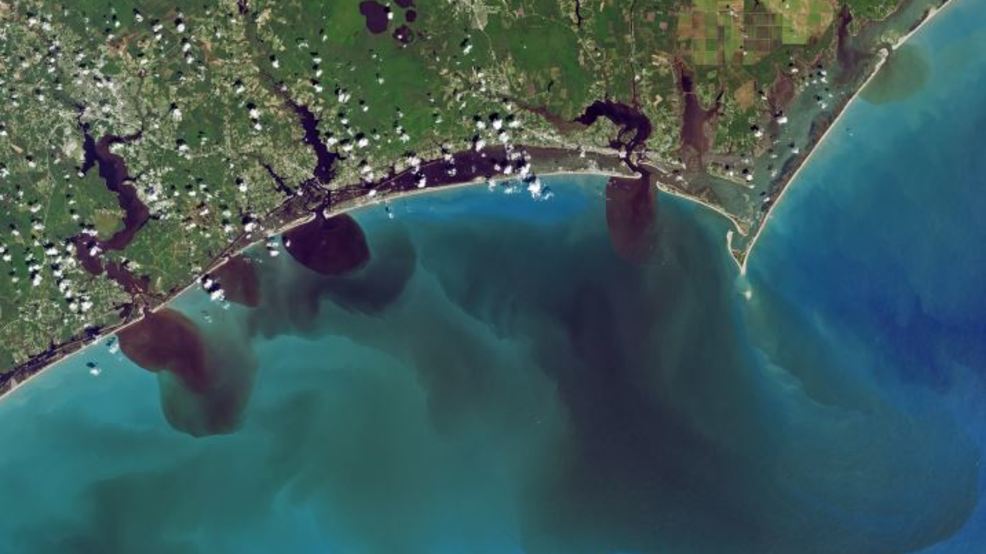 NASA can see dark, polluted Carolina rivers spilling into the ocean from space
