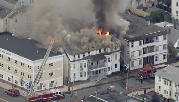 Dozens of fires and explosions are burning homes near Boston, forcing evacuations