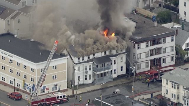 Dozens of fires and explosions are burning homes near Boston, forcing evacuations